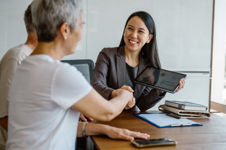 insurance agent meeting with couple