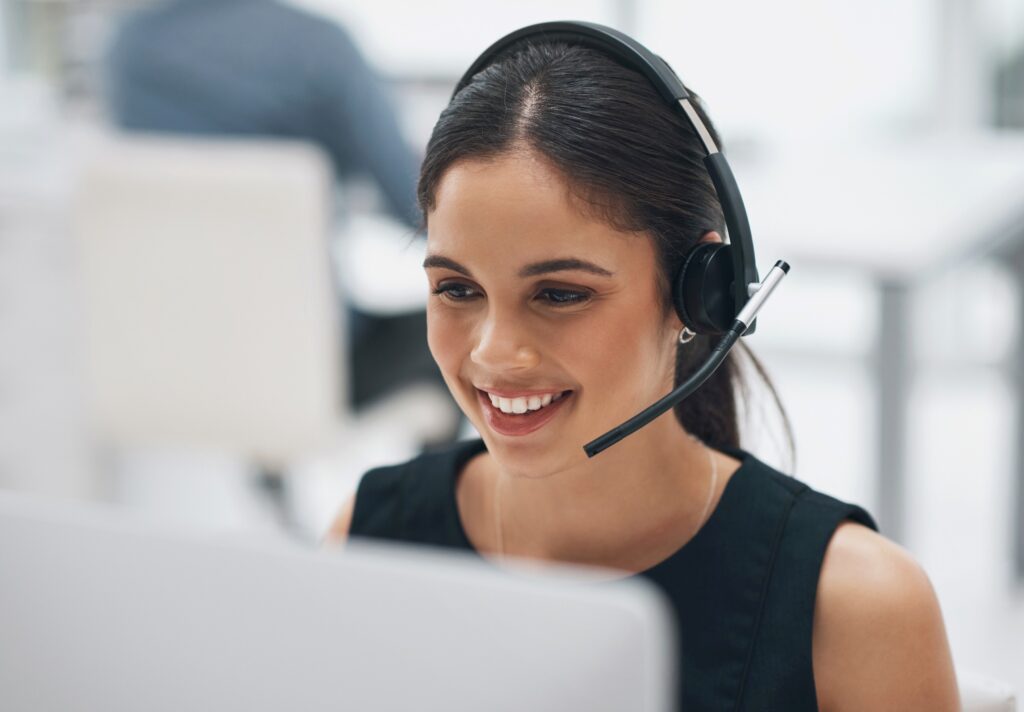 woman in call center wearing headset